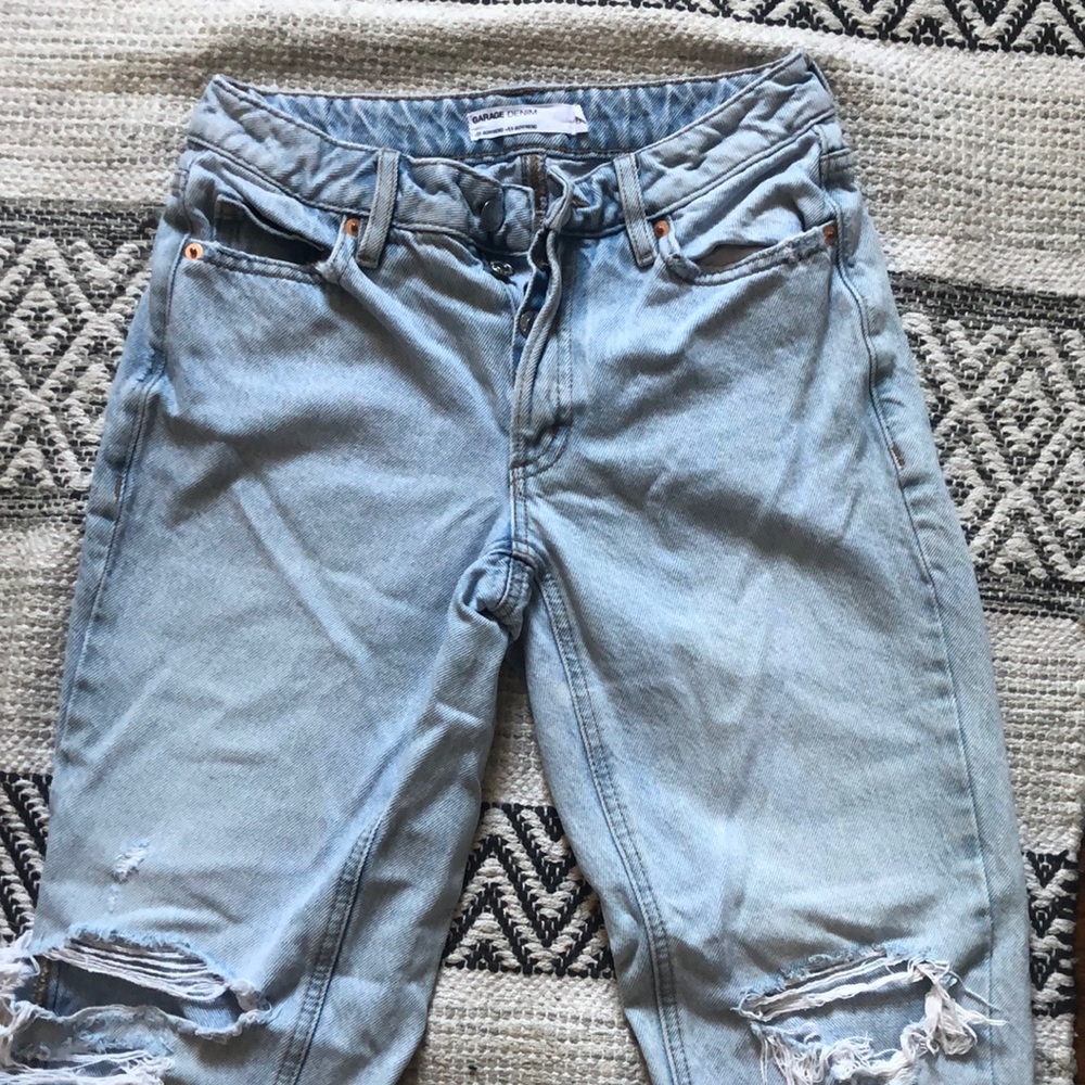 Garage brand light washed jeans. Size 00